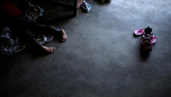 A girl sleeps on the floor at a shelter in the Lycee Philippe Guerrier after Hurricane Matthew in Les Cayes, Haiti, October 18, 2016. REUTERS/Andres Martinez Casares TPX IMAGES OF THE DAY
