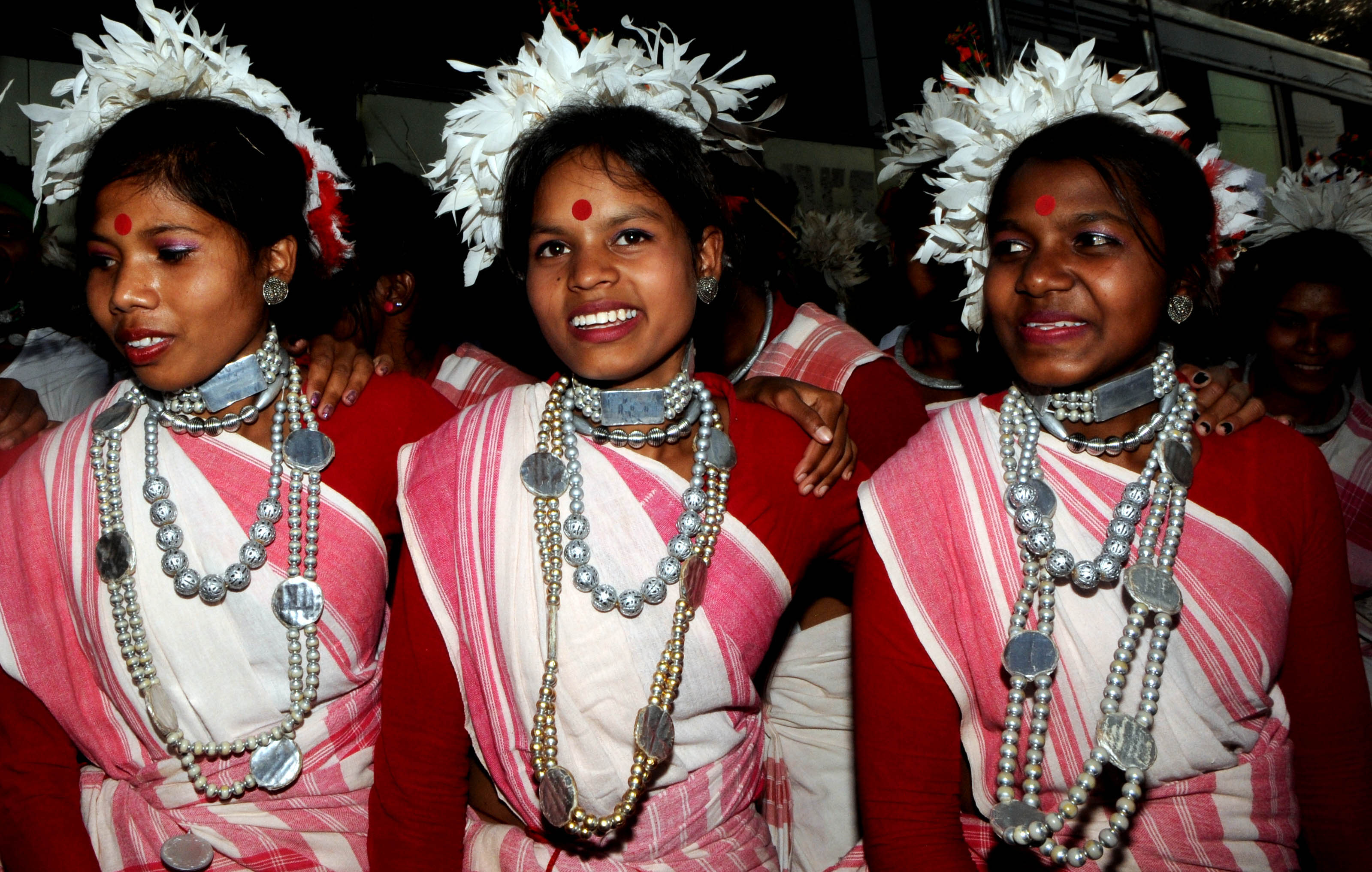 RANCHI, INDIA - MARCH 20: Tribal youths with their traditional dresses take part in Sarhul Festival procession on March 20, 2018 in Ranchi, India. The festival marks the beginning of New Year and is celebrated by the Oraon, the Munda and the Ho tribes, of the Jharkhand region. (Photo by Parwaz Khan/Hindustan Times via Getty Images)