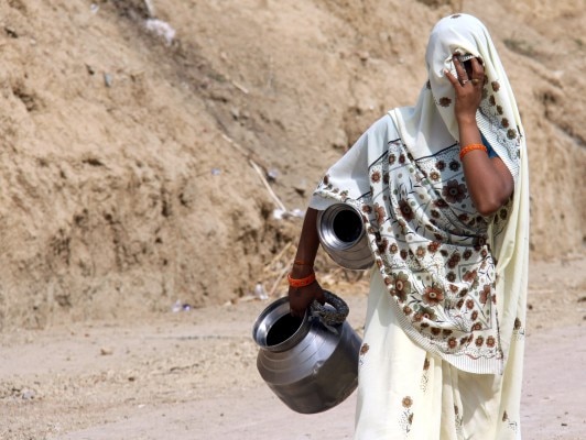 MAY 10, 2011 Banda : In summer of crop failure, water crisis, starvation deaths and suicides looms over Bundelkhand. This well in BundelkhandÕs Goira Mugli village is the lifeline for several villages in the vicinity. Women trek several miles under the scorching sun to fetch water. Photo : Naeem Ansari