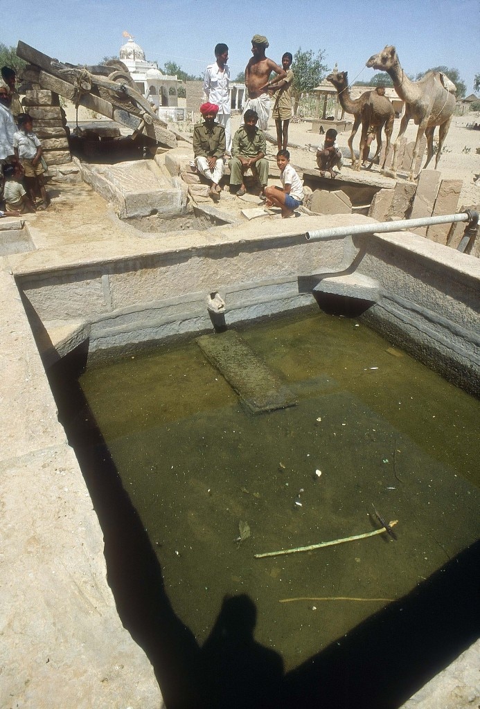 Villagers looking at water tank waiting for Water Crisis to be over in Rajasthan ( Rural Areas, News Profile )