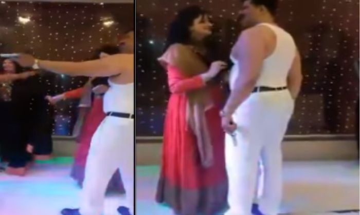 एक और वीडियो में दोनों हाथों में पिस्टल लिए किसी औरत के साथ नाचते दिख रहे हैं चैम्पियन