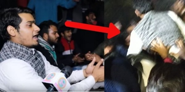 गेट के सामने भारत माता की जय के नारे लगाता शख्स जो योगेंद्र यादव पर हमला करने वालों में भी शामिल था.
