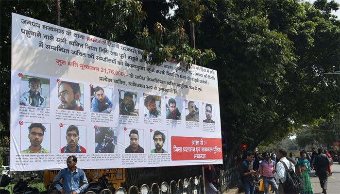सरकार ने 50 लोगों के पोस्टर लगाते हुए इनसे 64 लाख वसूलने को कहा था. (Photo: PTI) सरकार ने 50 लोगों के पोस्टर लगाते हुए इनसे 64 लाख वसूलने को कहा था. (Photo: PTI)