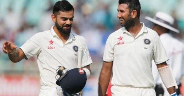 कप्तान विराट कोहली के साथ पुजारा. फोटो: AP Virat Pujara