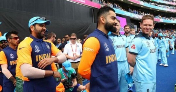 2019 विश्वकप में इंग्लैंड के खिलाफ मैच से पहले नेशनल एंथम के लिए जाती टीमें. फोटो: Getty Images Virat Morgan