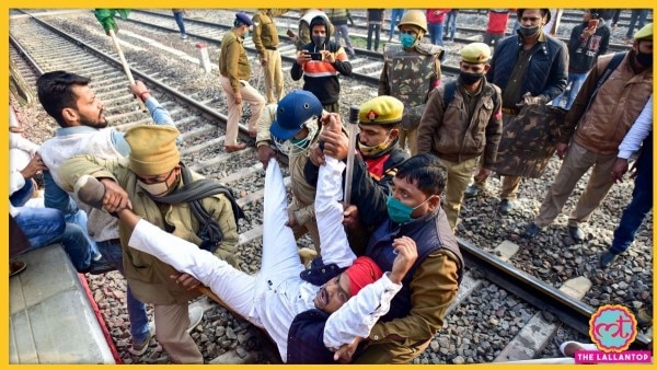 समाजवादी पार्टी कार्यकर्ता रेल रोकने के लिए पटरियों पर उतरे, पुलिस ने उन्हें हटाया. (फोटो-पीटीआई) Sale(603)