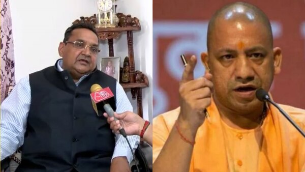 उत्तर प्रदेश राज्य विधि आयोग के अध्यक्ष एएन मित्तल बाएं, और सीएम योगी दाएं. फोटो- आजतक Jansankhya (2)