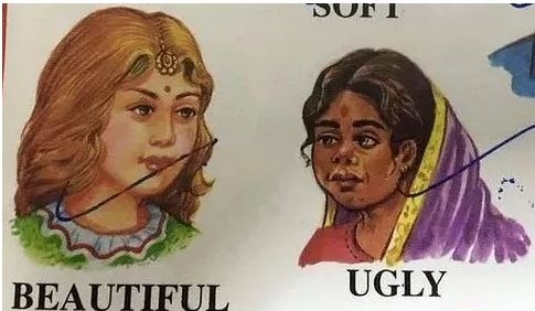 हमें लखनऊ की एक प्राइवेट स्कूल की टीचर ने बताया कि उनके स्कूल में जो बुक्स पढ़ाए जाते हैं उनमें सुंदर और बदसूरत के लिए क्रमशः गोरी और सांवली महिला की तस्वीरों का इस्तेमाल किया जाता है. जबकि सुंदर और बदसूरत जैसी चीज़ें बच्चों को पढ़ाई ही नहीं जानी चाहिए. फोटो- सोशल मीडिया Schoolbook