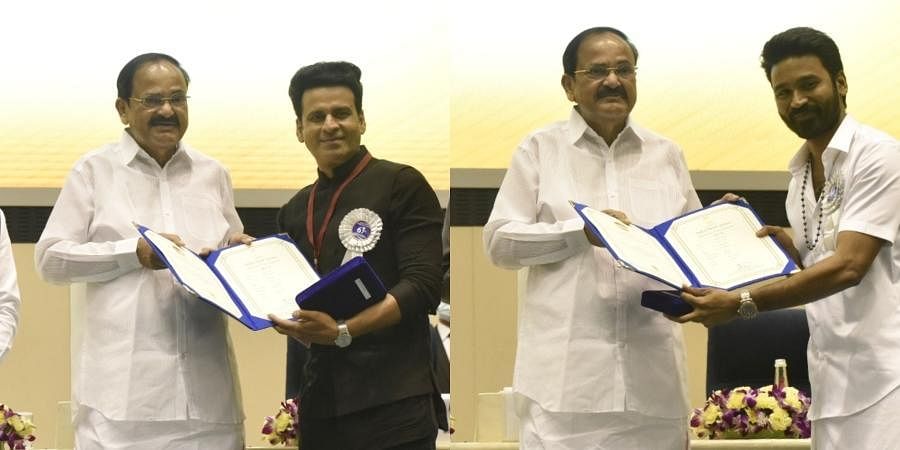 'भोसले' और 'असुरन' के लिए बेस्ट एक्टर का नेशनल अवॉर्ड स्वीकार करते मनोज बाजपेयी और धनुष. 'भोसले' और 'असुरन' के लिए बेस्ट एक्टर का नेशनल अवॉर्ड स्वीकार करते मनोज बाजपेयी और धनुष.