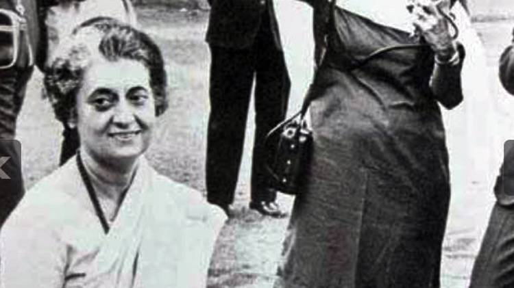 Homai in action as she she clicks Indira Gnadhi