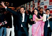 Tandan grooving to the music with actor Anil Kapoor at Slumdog Millionaire’s Mumbai premiere Tandan grooving to the music with actor Anil Kapoor at Slumdog Millionaire’s Mumbai premiere