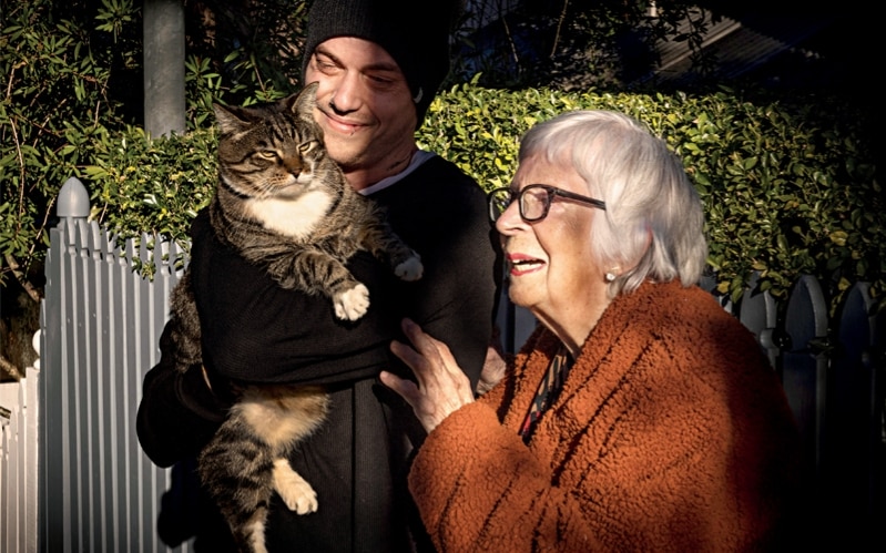 Mike Hohnen and Enid Morrison with Bootsy the cat. Photo: jessica hromas/the guardian