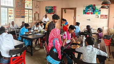 Good News: Pay Garbage for Food, Wellness for Rural Women, and More