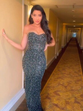 ब्लैक बॉडीकॉन ड्रेस में नोरा फतेही, संवारती दिखीं बाल, एटीट्यूड पर फिदा हुए फैन्स