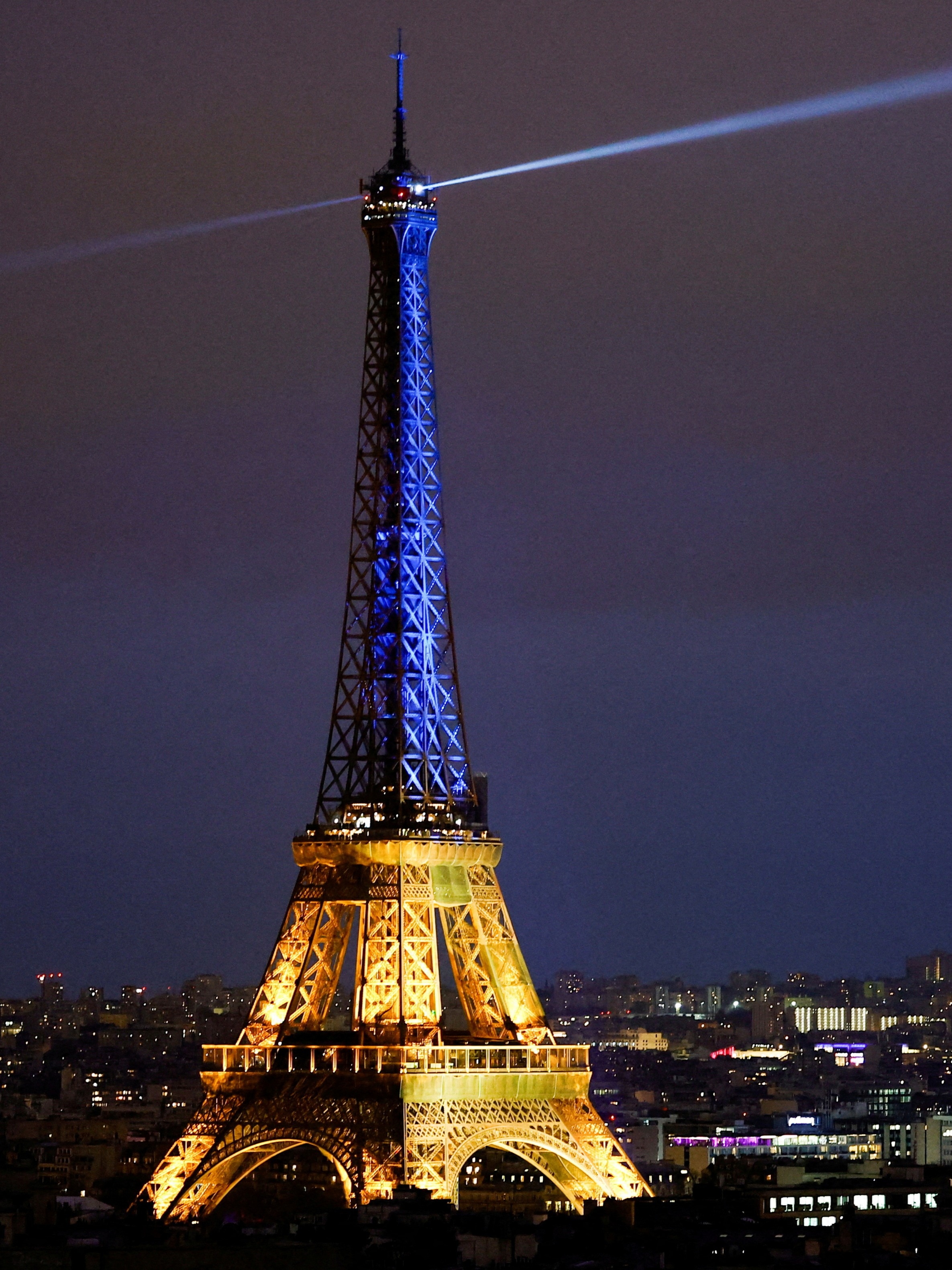 UkraineRussia War Eiffel Tower, Trafalgar Square Lit In Yellow And