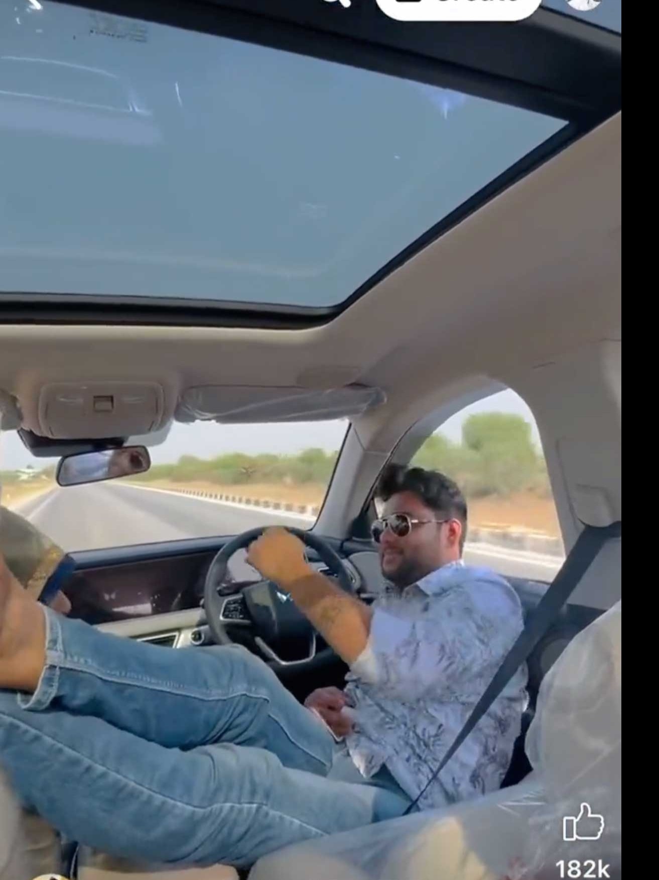 Dangerous misuse of ADAS! Man leaves Mahindra XUV 700 steering wheel to make Instagram reel
