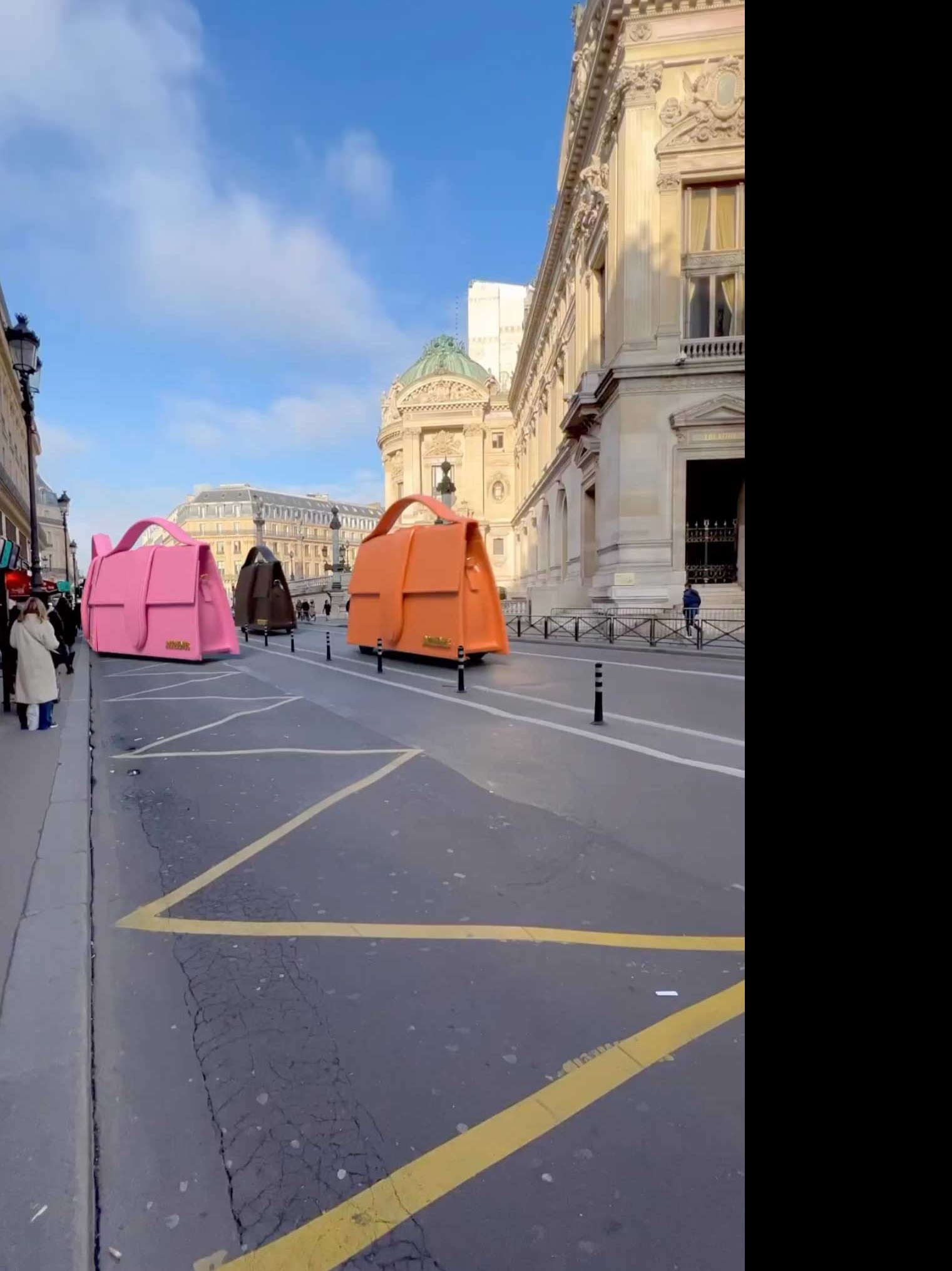 Giant Jacquemus handbags on wheels take over the streets of Paris. But ...