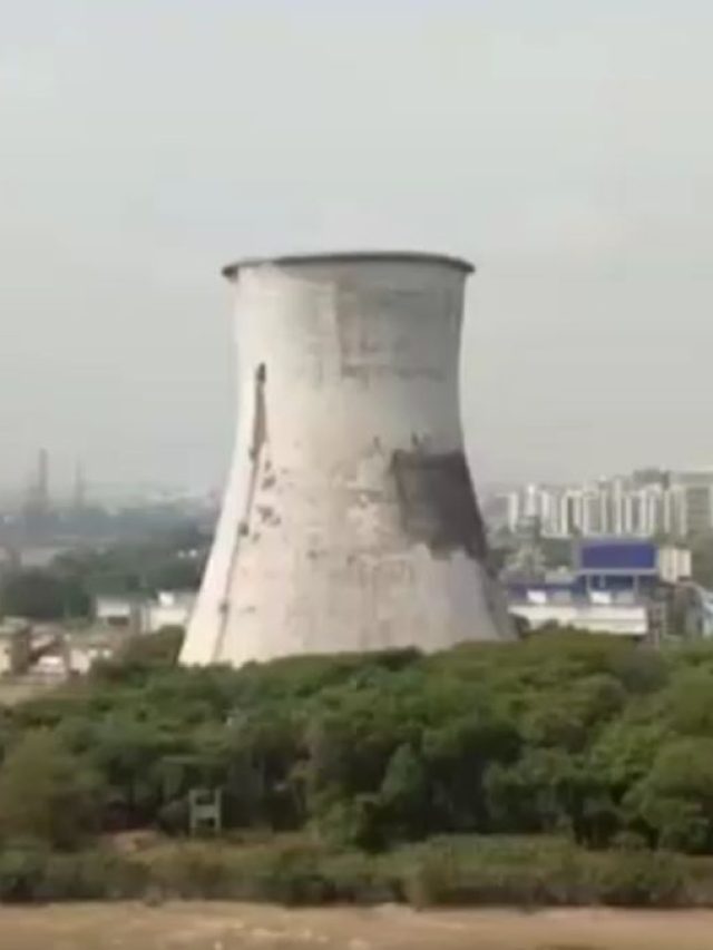 नोएडा के ट्विन टावर की तरह जमींदोज हुआ सूरत का कूलिंग टॉवर, देखें तस्वीरें