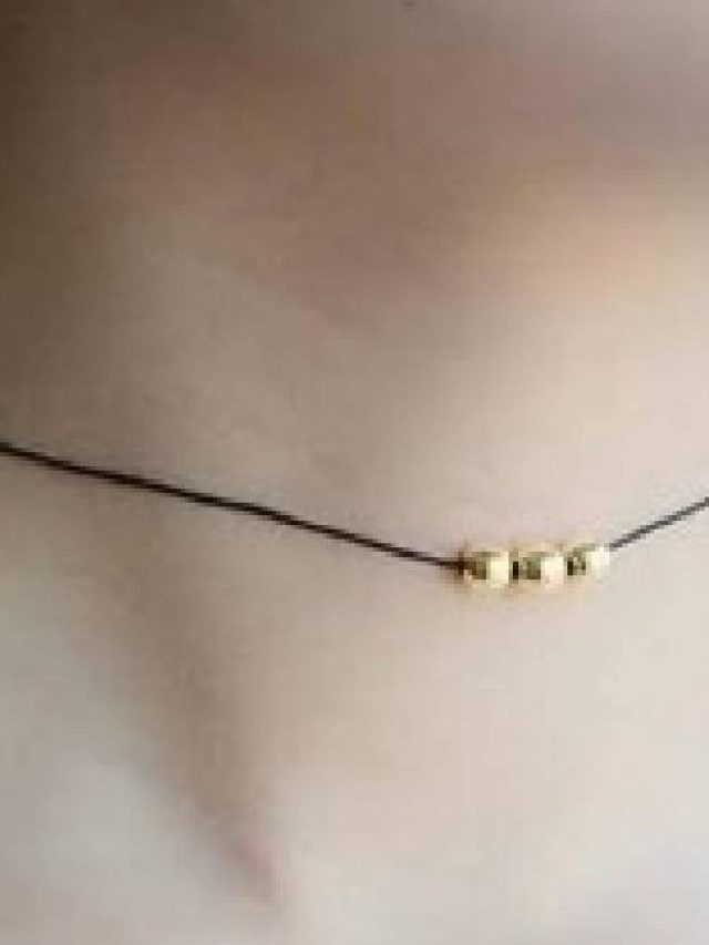 গলায় কালো সুতো পরলে কী হয়? জানুন