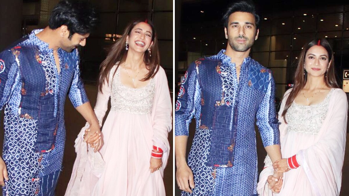 मांग में सिंदूर-चूड़ा पहने दिखी नई दुल्हन कृति, पति का थामा हाथ, पैप्स को खिलाई मिठाई