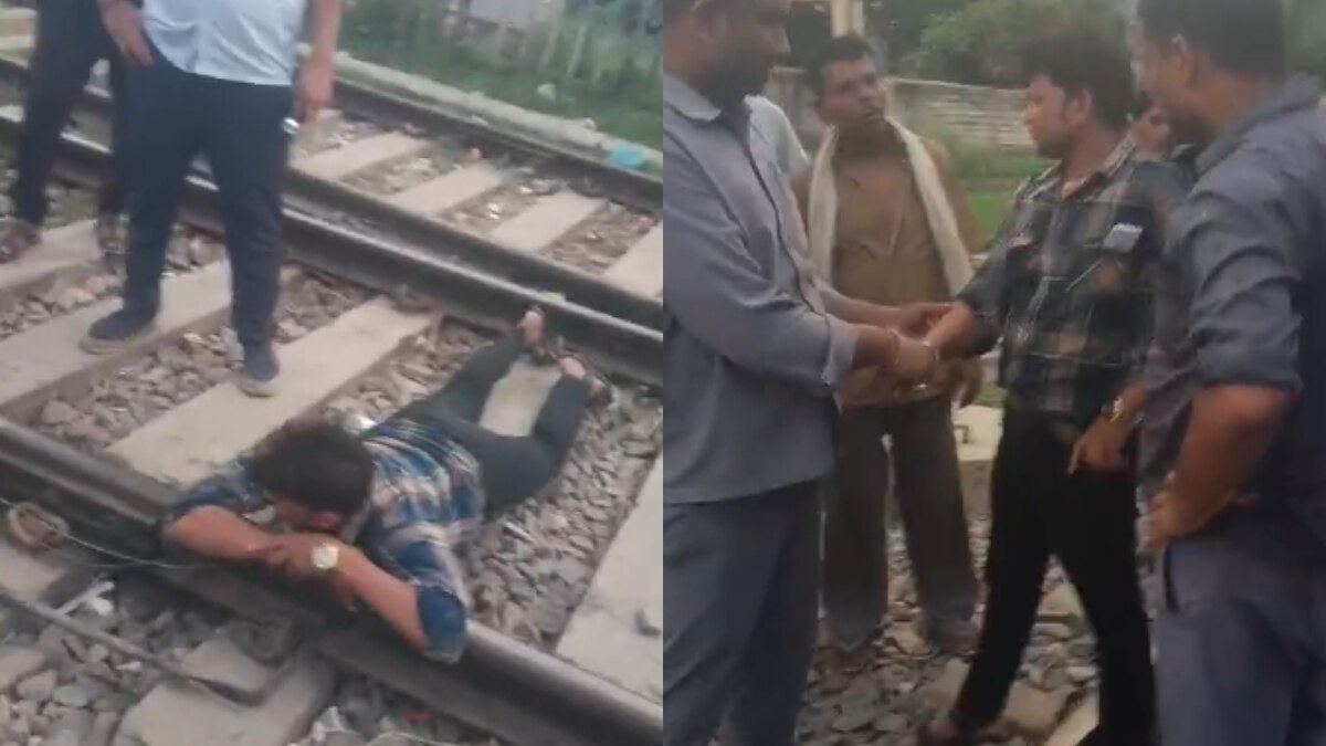 ट्रेन की पटरी पर लेटा पत्नी से नाराज पति, रेलवे कर्मियों ने बचाई जान, देखें वीडियो
