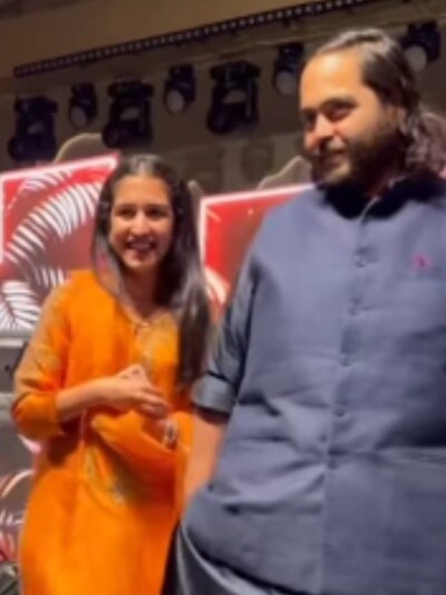 पति अनंत का हाथ थामे राधिका का रोमांटिक अंदाज, ऑरेंज सूट में लगीं खूबसूरत