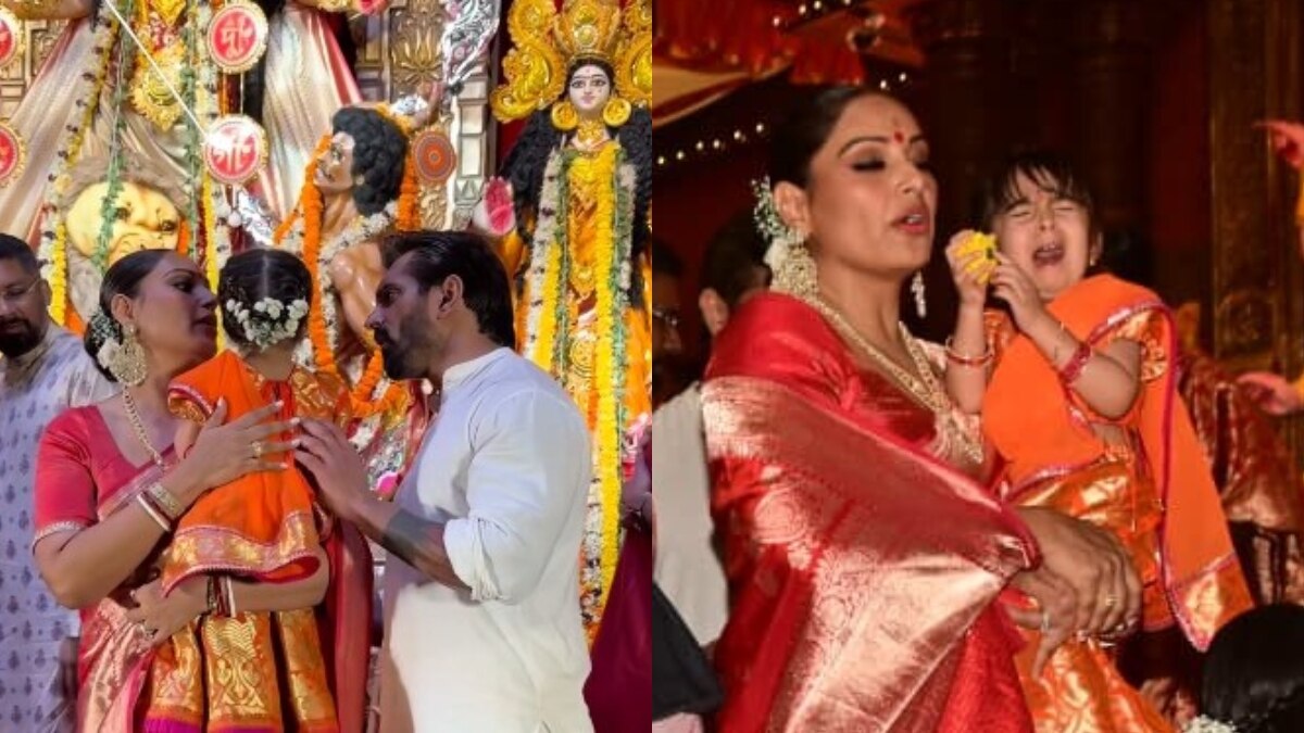 गोद में रोती हुई बेटी को बिपाशा ने संभाला, छुए करोड़पति फिल्म मेकर के पैर, इम्प्रेस फैंस