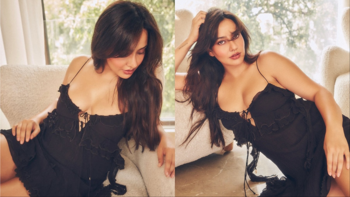 ब्लैक ड्रेस में नेहा शर्मा ने गिराईं बिजलियां, फर्श पर बैठकर दिए कातिलाना पोज; PHOTOS